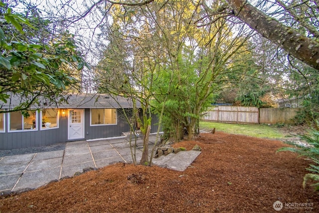 exterior space with a patio area and fence