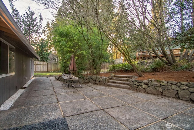 view of patio with fence