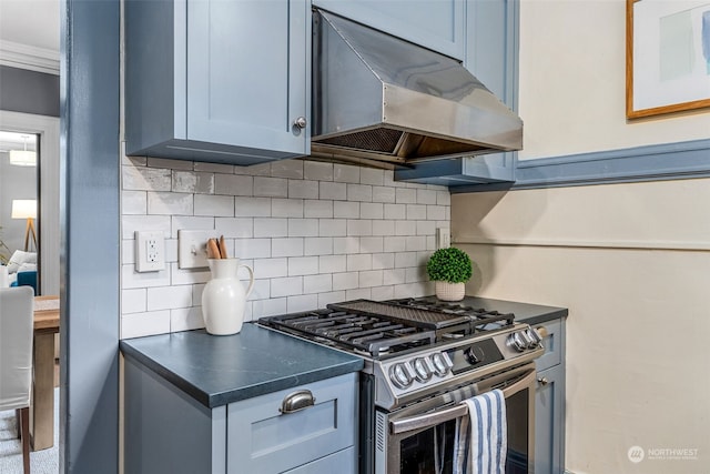 kitchen featuring ventilation hood, gas range, and decorative backsplash