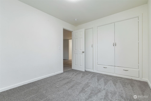 unfurnished bedroom with carpet