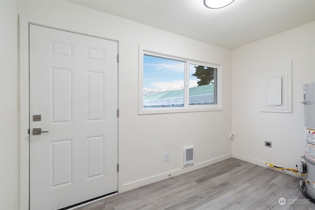 spare room featuring light hardwood / wood-style floors