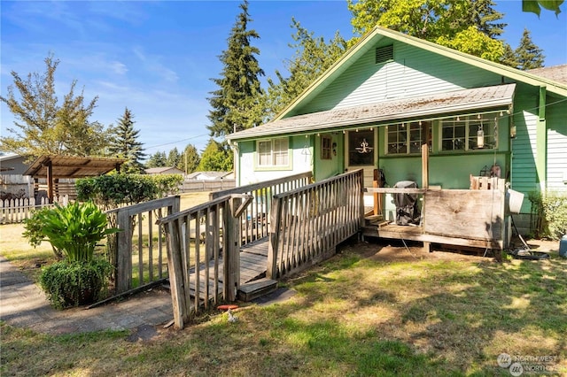 view of front of house with a wooden deck