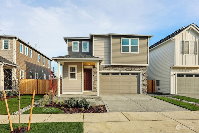 view of front facade featuring a front lawn and a garage