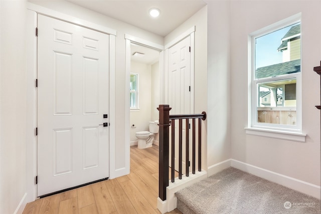 foyer with light hardwood / wood-style flooring