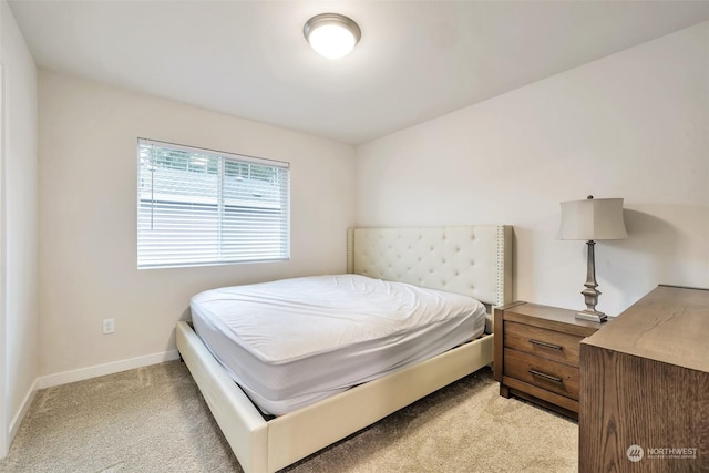 13307 Pines Ln E, Puyallup, WA 98374 - bedroom featuring light carpet and baseboards