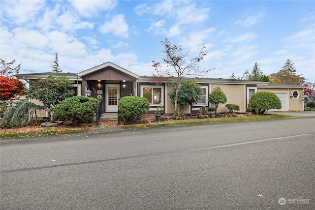 view of front of property featuring a garage