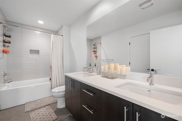 full bathroom with vanity, toilet, shower / bathtub combination with curtain, and tile patterned flooring