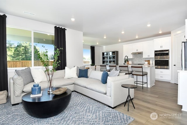 living room featuring light hardwood / wood-style floors