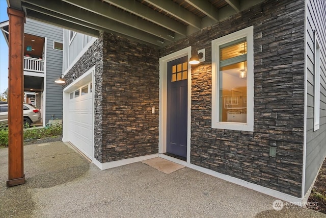 property entrance with a garage