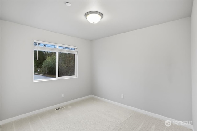 view of carpeted spare room