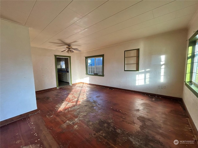 spare room with dark hardwood / wood-style flooring