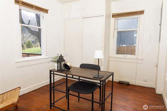 office area featuring baseboards and dark wood-style floors