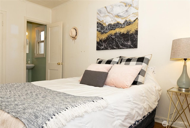 bedroom with crown molding