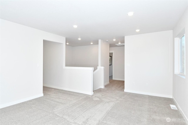 1112 SE 33rd St, Battle Ground, WA 98604 - spare room featuring recessed lighting and light carpet