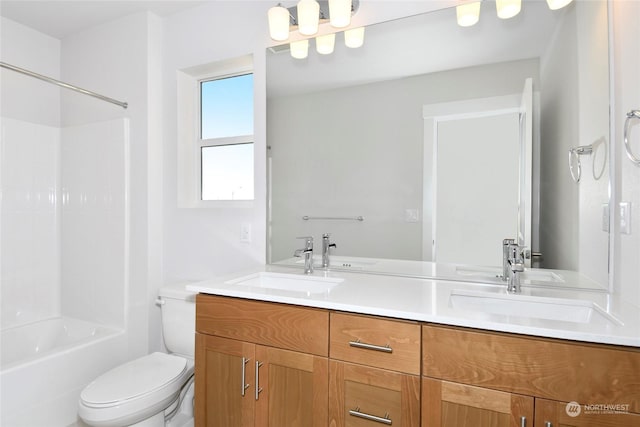 full bathroom with vanity, toilet, and bathing tub / shower combination