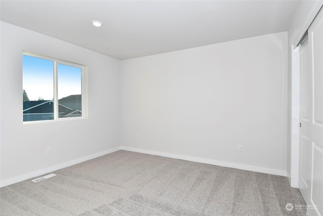 spare room with carpet flooring