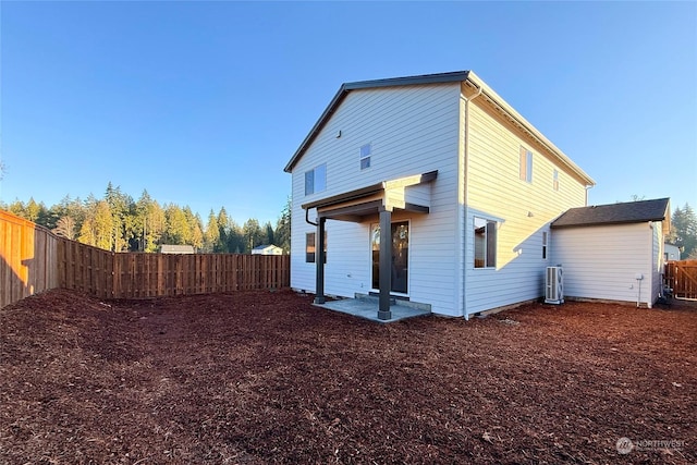 back of property featuring a patio area and central AC unit