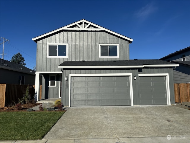 front facade with a garage