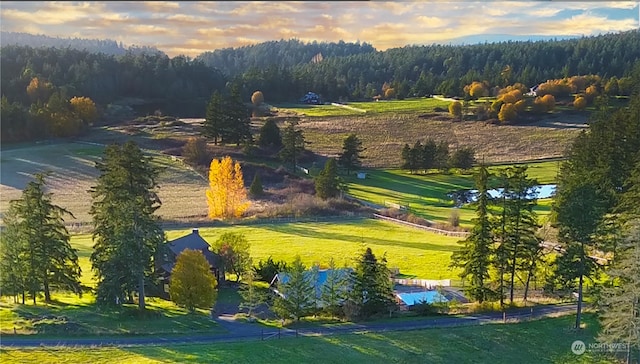 view of home's community featuring a rural view