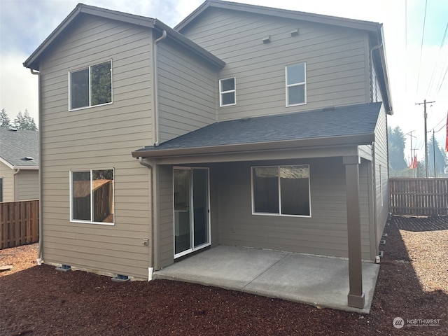 rear view of house featuring a patio