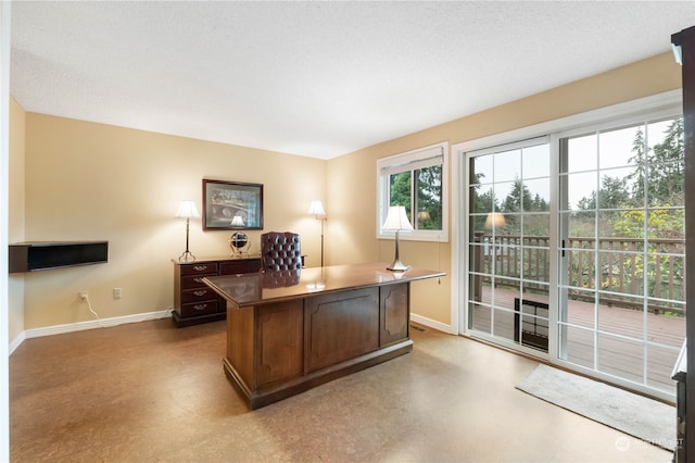 office with a textured ceiling