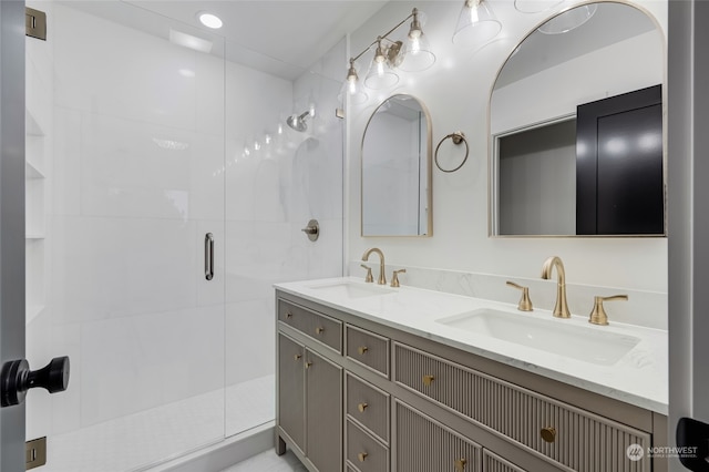 bathroom with vanity and an enclosed shower