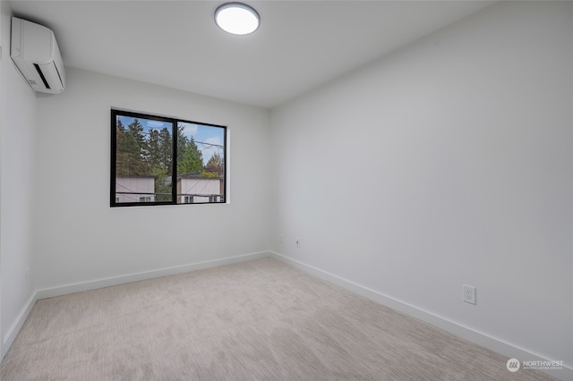 carpeted empty room featuring a wall mounted air conditioner