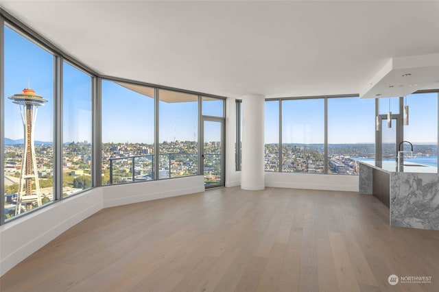 unfurnished sunroom with a healthy amount of sunlight