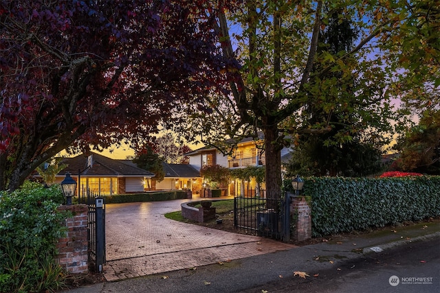 view of property hidden behind natural elements