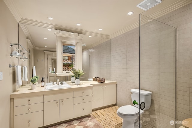 bathroom with an enclosed shower, ornamental molding, vanity, tile walls, and toilet