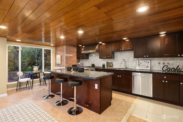 kitchen with sink, stainless steel dishwasher, dark stone countertops, a kitchen island, and wood ceiling