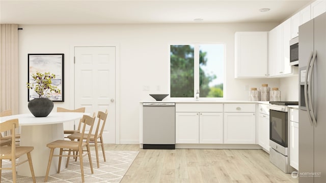 kitchen featuring white cabinetry, stainless steel appliances, and light wood-type flooring