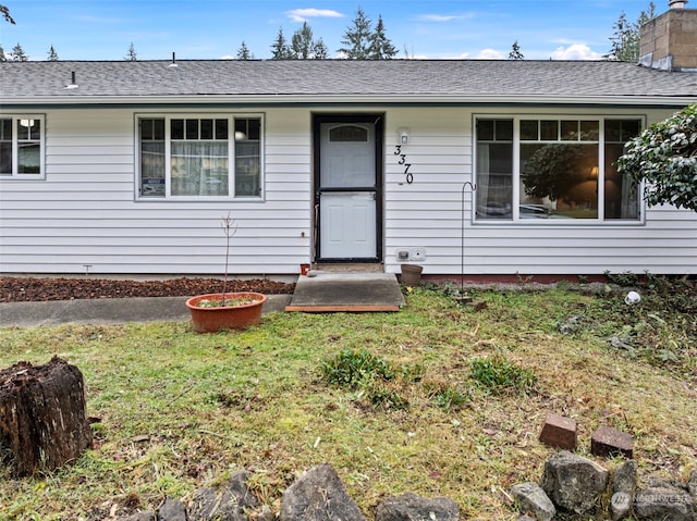 ranch-style house with a front yard