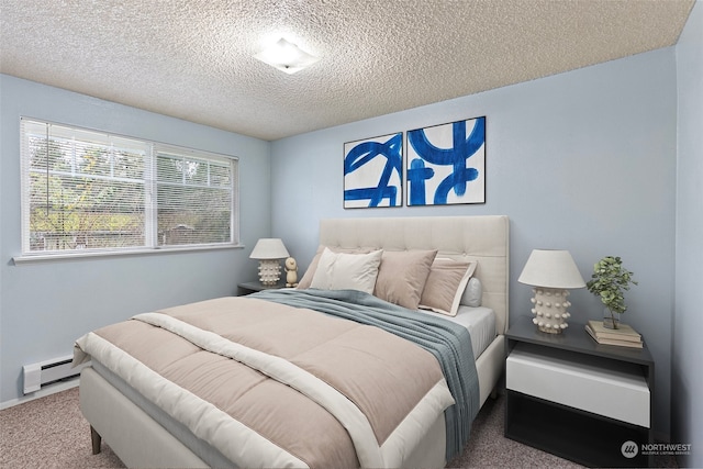 carpeted bedroom with a textured ceiling and a baseboard radiator