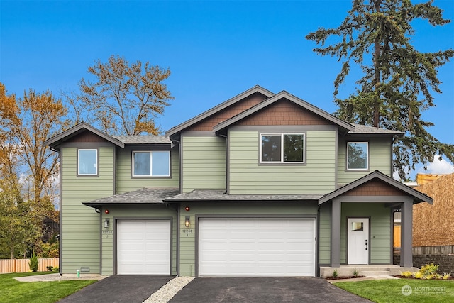 view of front of property featuring a garage