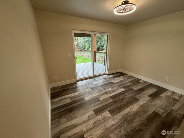 empty room featuring dark hardwood / wood-style floors