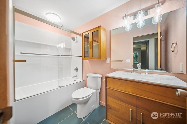 full bathroom with tile patterned flooring, vanity, toilet, and enclosed tub / shower combo