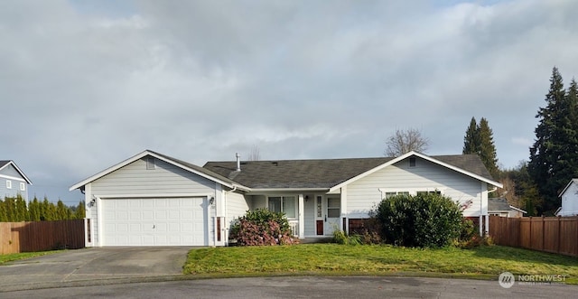 ranch-style house with a front yard and a garage