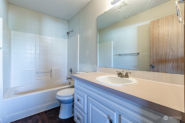 full bathroom featuring toilet, vanity, shower / bathtub combination, and hardwood / wood-style flooring