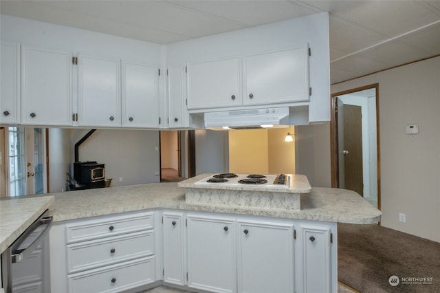 kitchen with white cabinets, kitchen peninsula, white stovetop, and stainless steel dishwasher