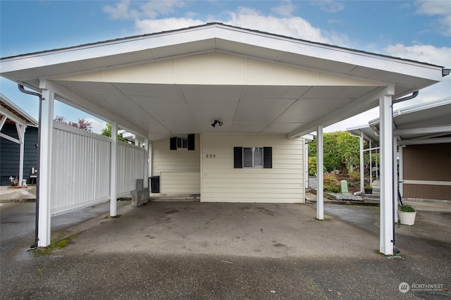 view of parking featuring a carport