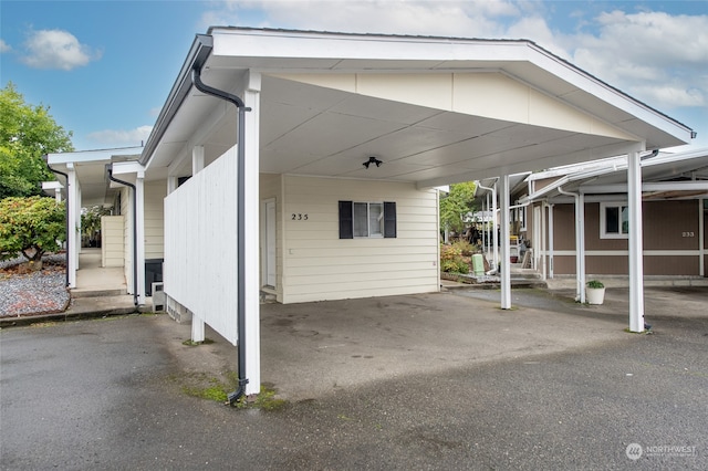 view of patio / terrace with a carport