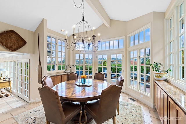 sunroom with vaulted ceiling with beams, french doors, and an inviting chandelier