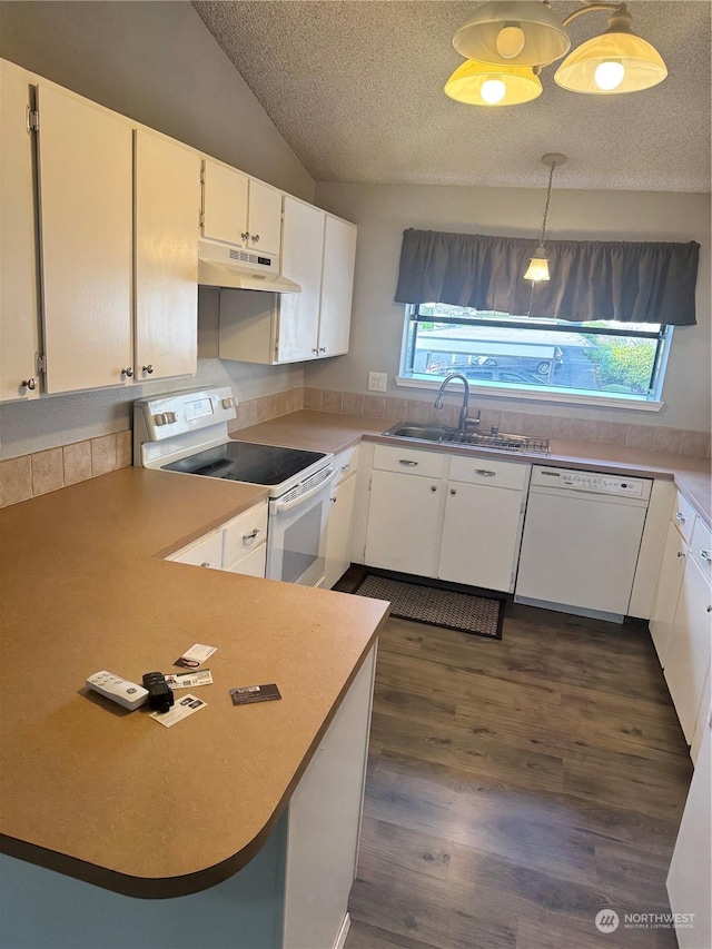 kitchen featuring sink, white cabinets, white appliances, and decorative light fixtures