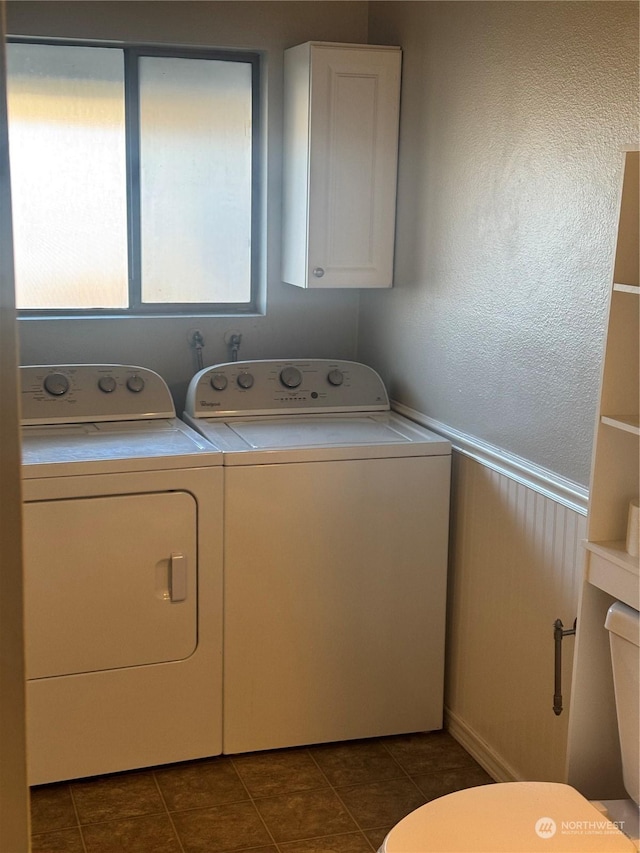 clothes washing area with tile patterned flooring and washing machine and dryer