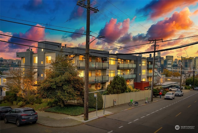 view of outdoor building at dusk