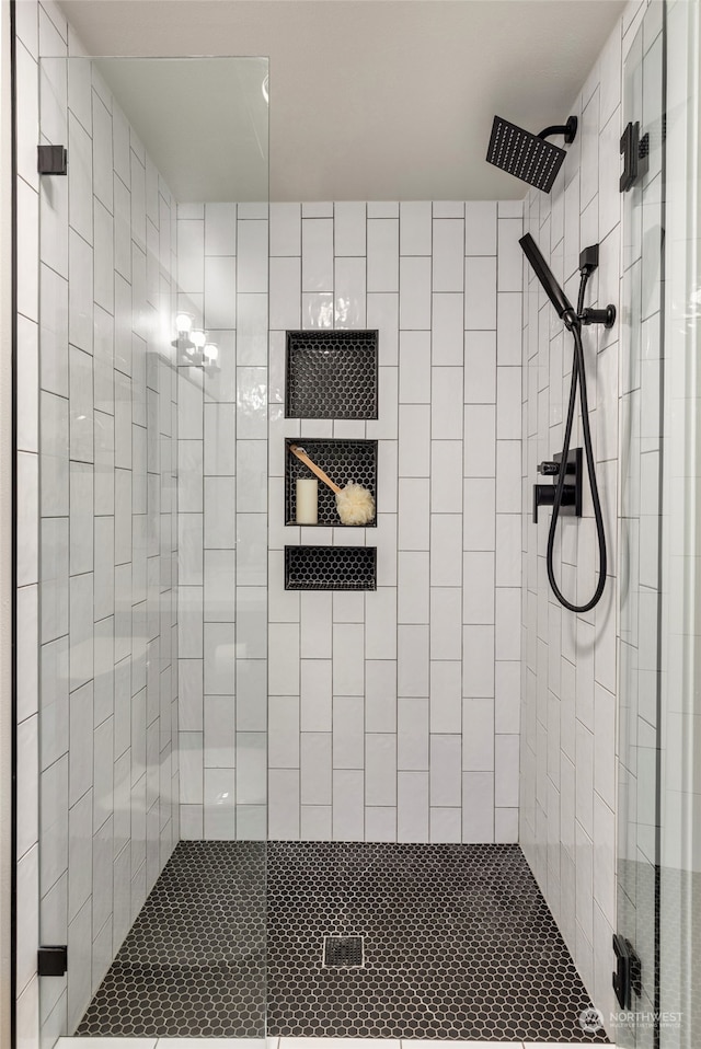 bathroom featuring an enclosed shower