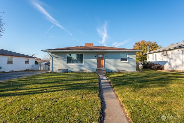 view of front facade with a front yard