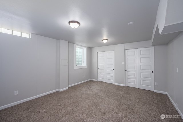 basement featuring carpet flooring