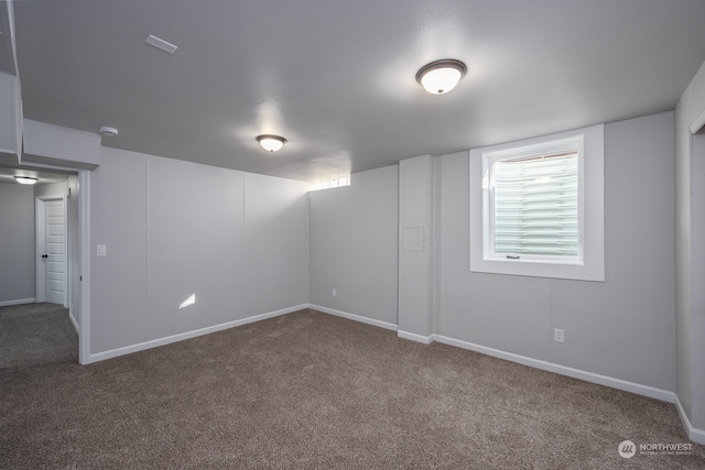 unfurnished room featuring carpet flooring